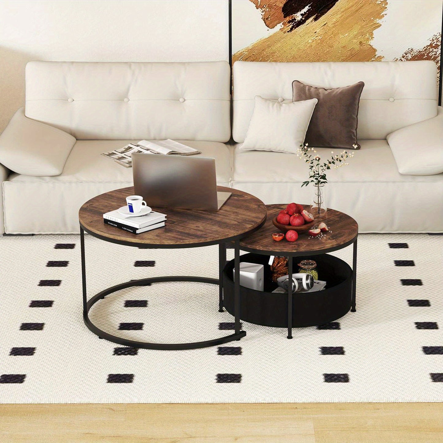 Nutshell 2 in 1 round Nesting Coffee Table Set in a modern living room with decorative items