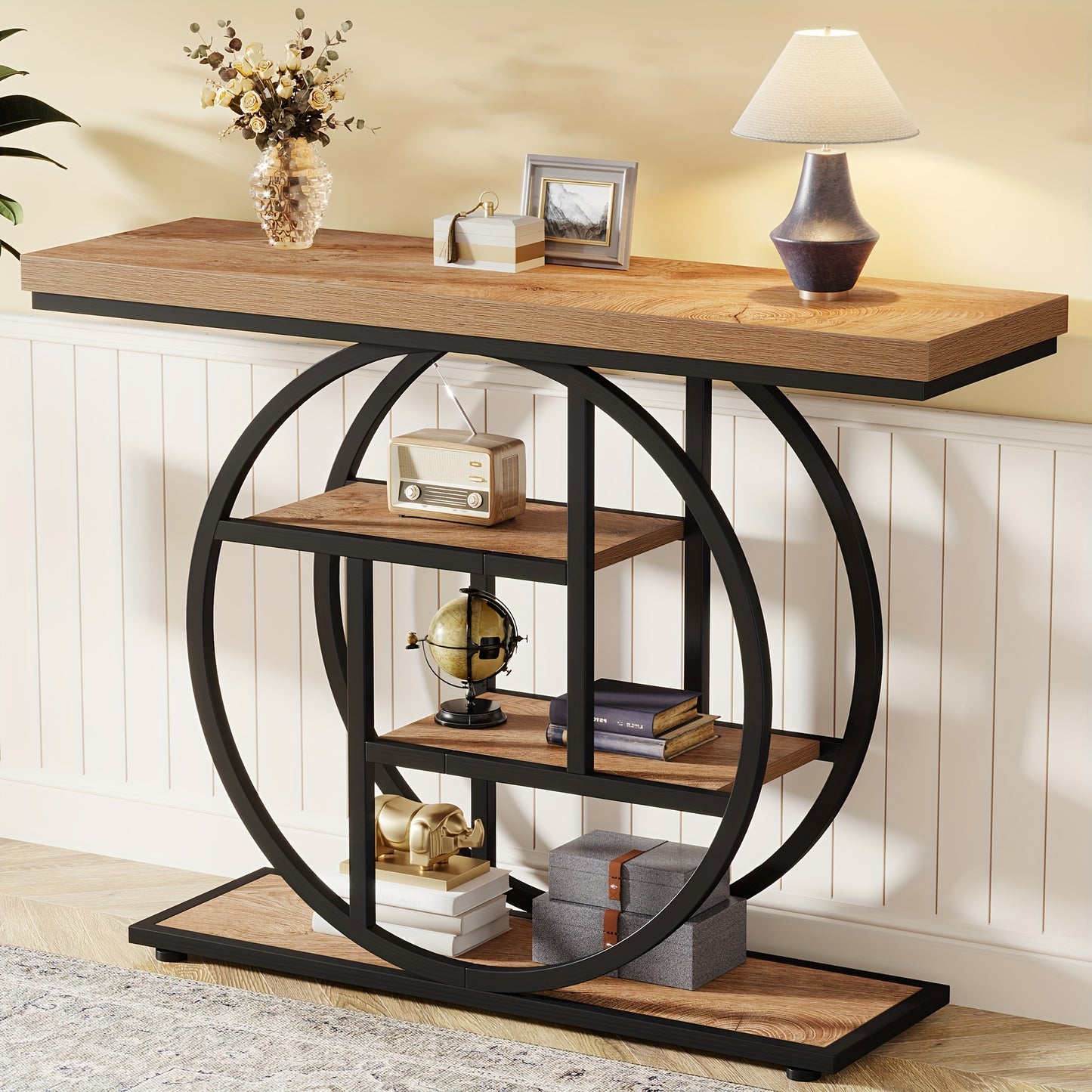 Nutshell 4-Tier Sofa Table Entryway Table with circular black metal frame and wooden shelves holding decor and lamp