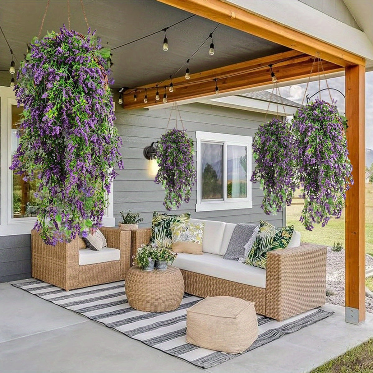 Decorative artificial lavender hanging plants in stylish porch setting with comfortable seating