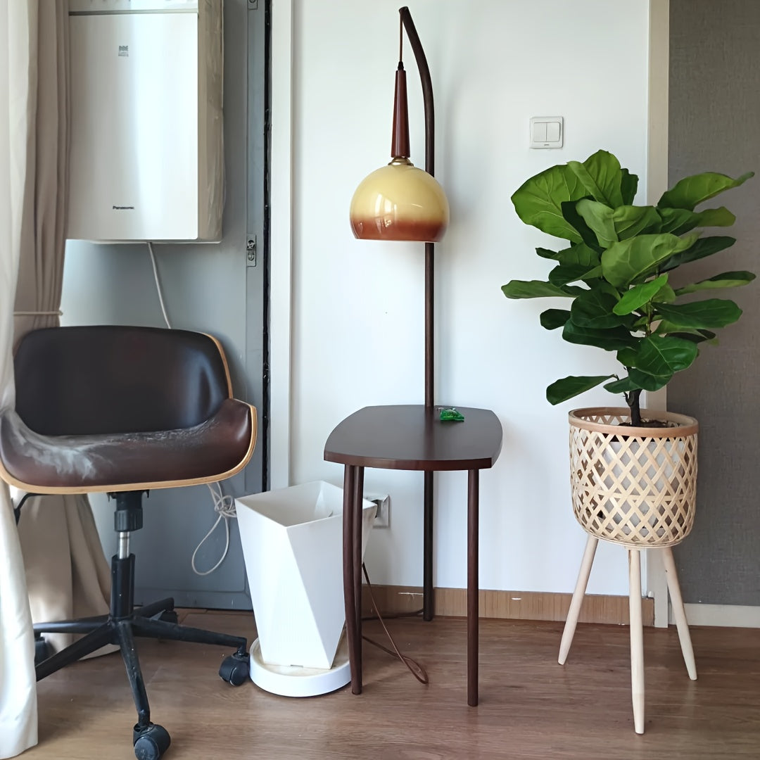 Bamboo Woven Flower Stand with legs displayed alongside a modern chair and lamp in a stylish room setting