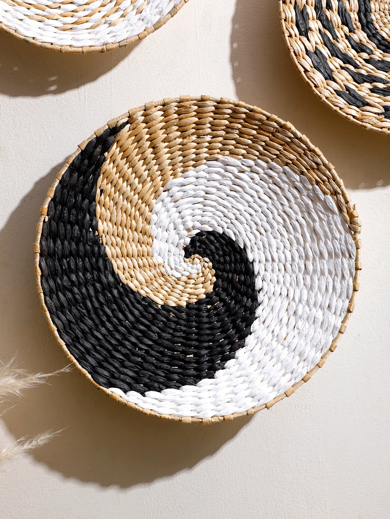Nutshell bohemian wall decor woven basket with black white and natural colors swirl pattern