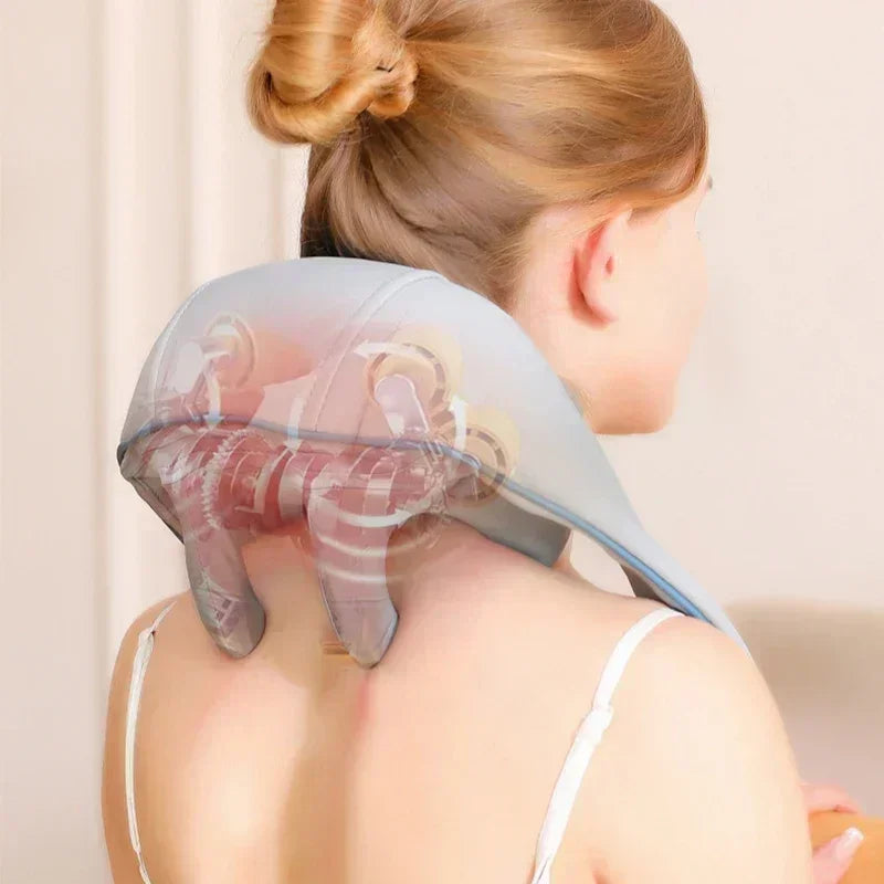 Woman wearing Nutshell 3D kneading neck massager with heat on shoulders for soothing muscle relief
