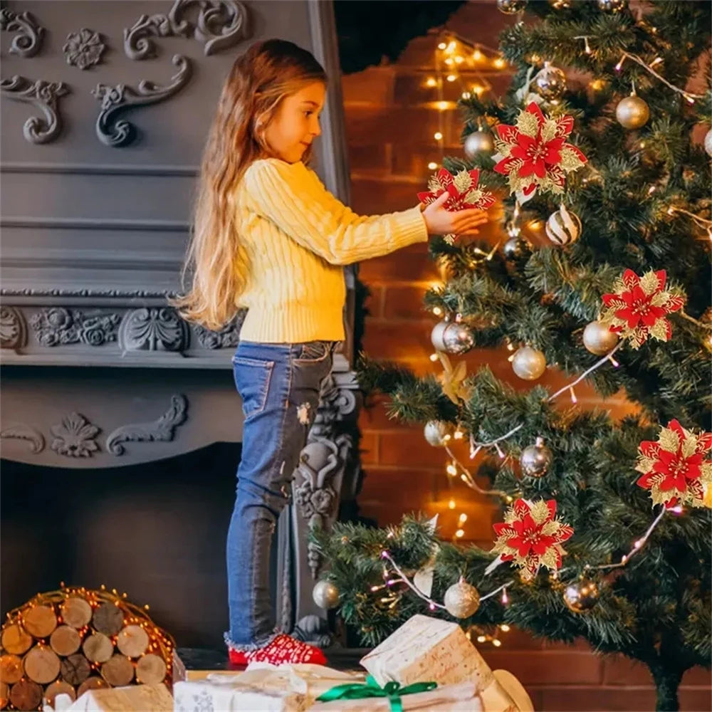 Girl decorating a Christmas tree with colorful Christmas flower ornaments and golden ornaments