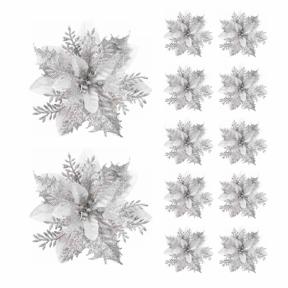 Silver Christmas flower ornaments arranged in a decorative pattern for festive holiday decor
