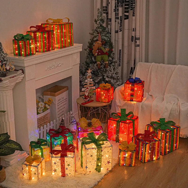 Colorful Christmas light up gift boxes with festive ribbons illuminating a cozy living room setting