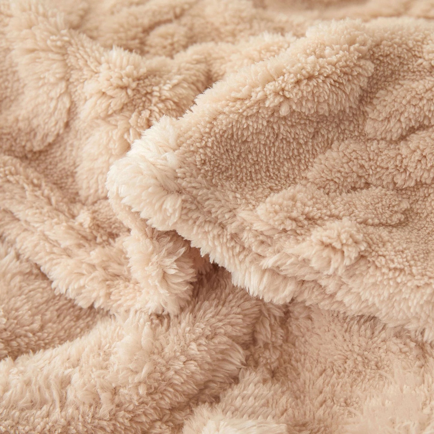 Nutshell beige plush sherpa warm sofa throw blanket draped to show soft texture and cozy pile