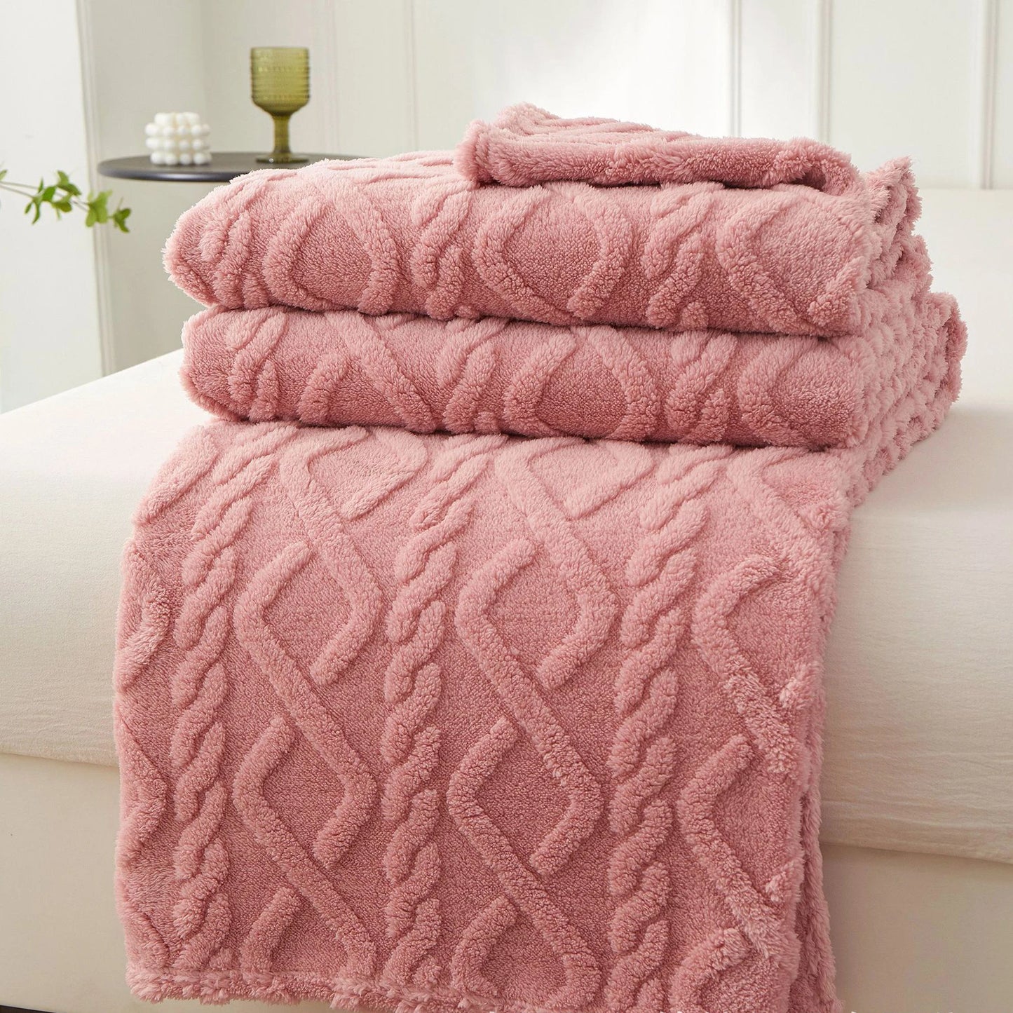 Nutshell pink plush cable knit warm sofa throw blanket folded on sofa cozy textured fleece for living room
