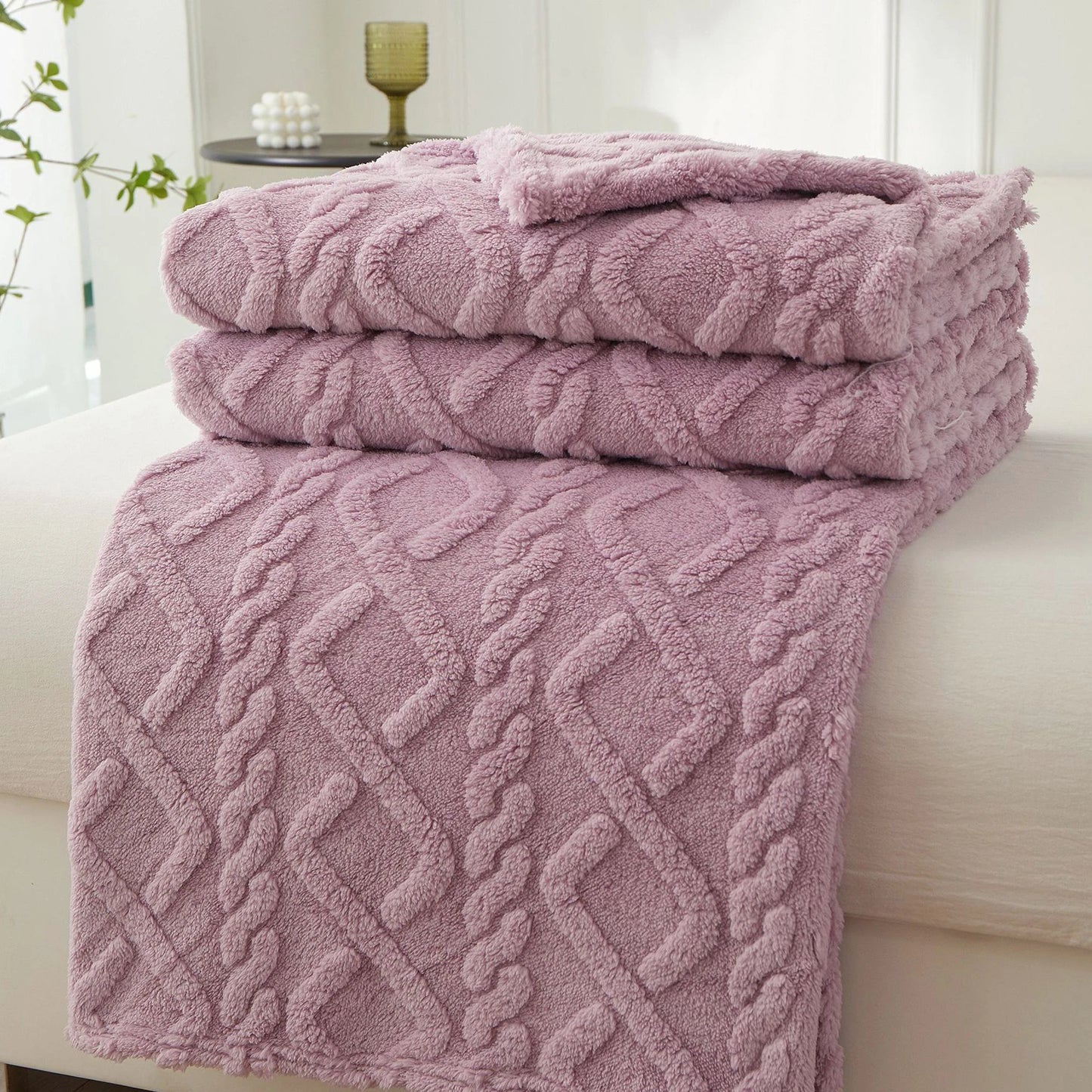 Nutshell mauve cable knit plush blanket folded on sofa decorative warm sofa throw blanket for cozy living rooms