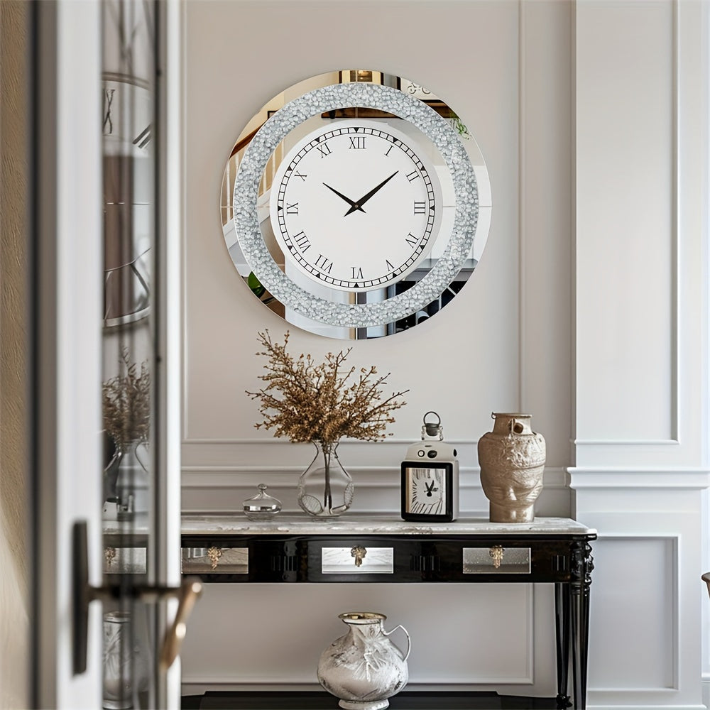 Nutshell elegant glass mirrored wall clock with Roman numerals hanging above a decorative console table