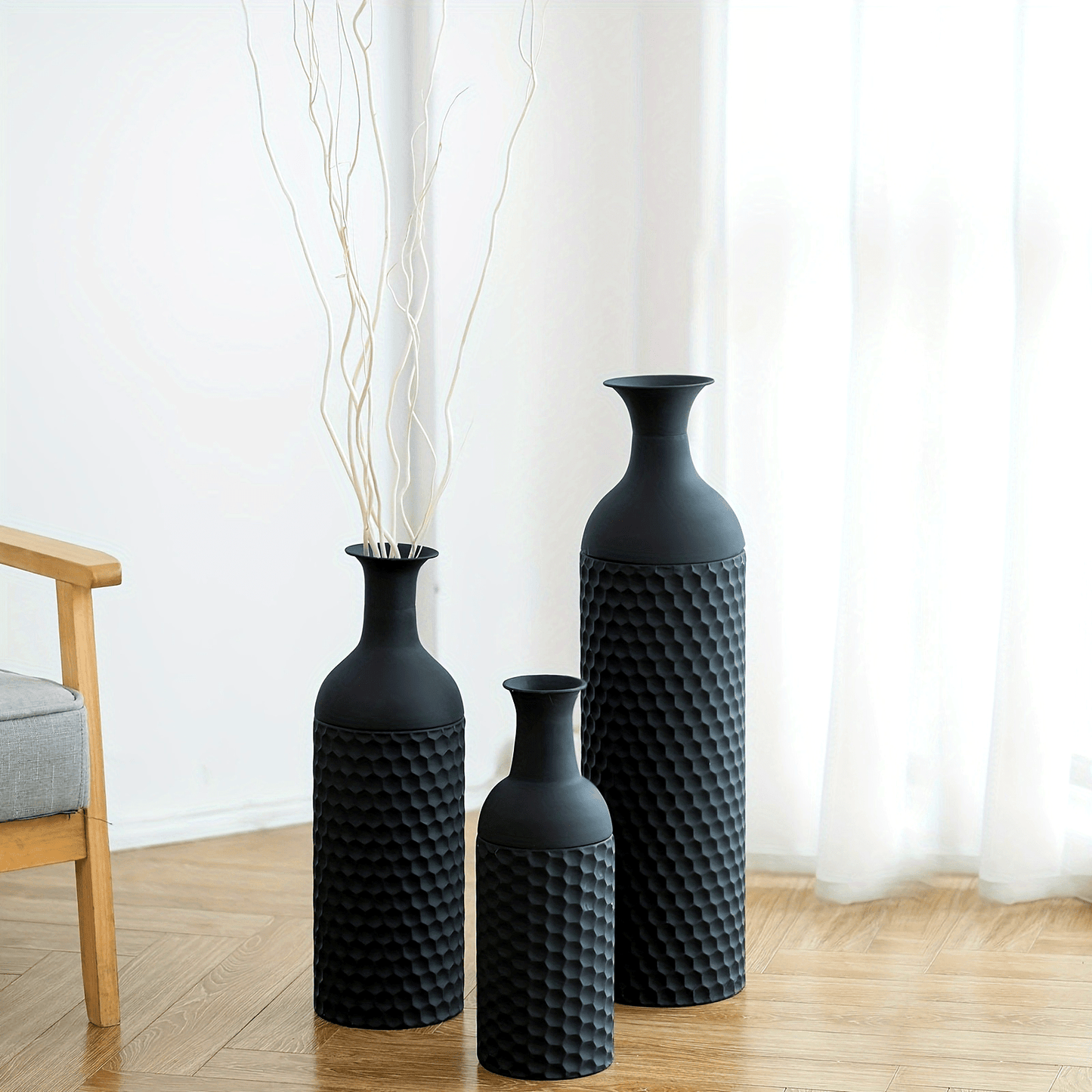 Set of three extra large metal floor vases in black with textured designs for home decor