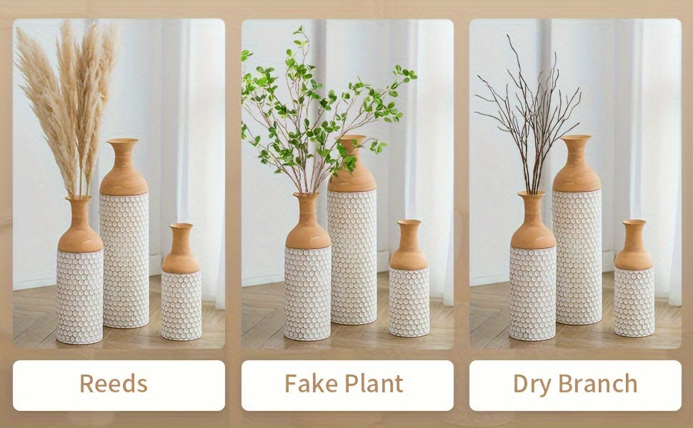 Extra large metal floor vases from Nutshell styled with reeds, fake plants, and dry branches