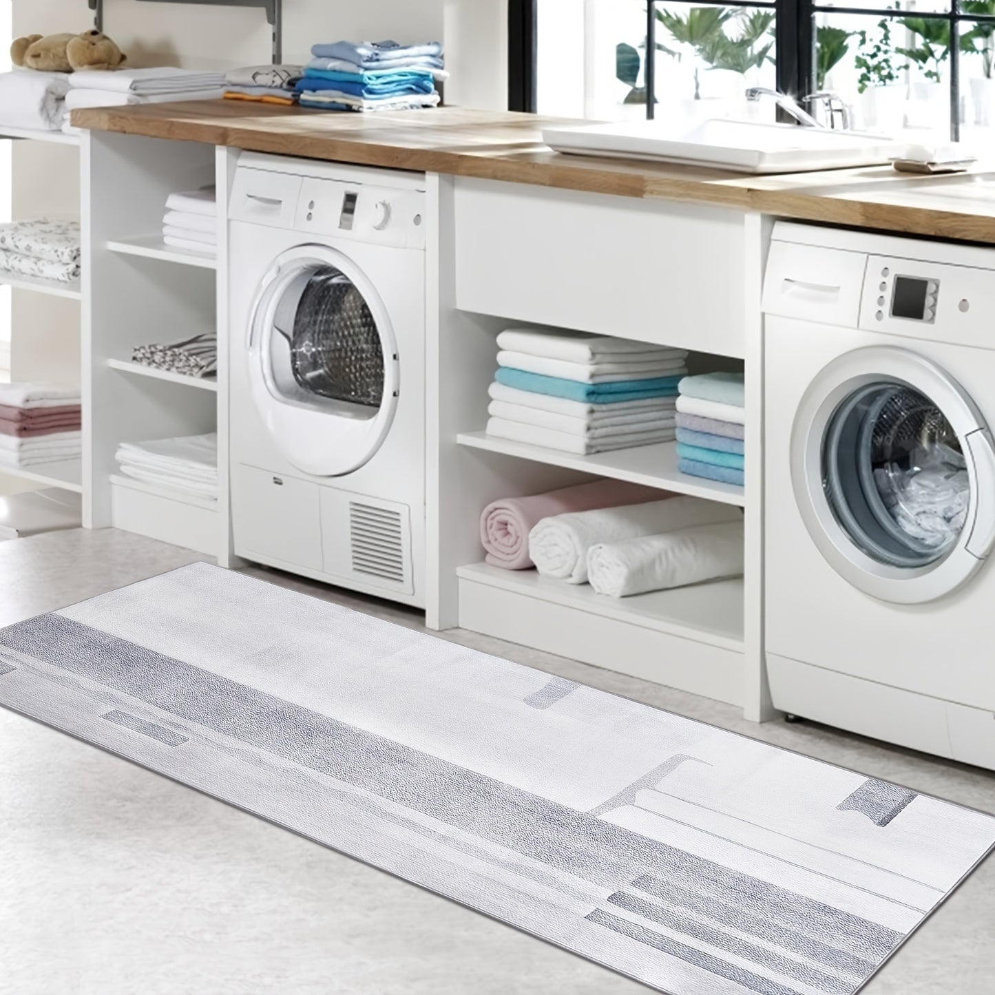 Nutshell grey hallway runner rug adding style to a modern laundry room with appliances and organized shelves