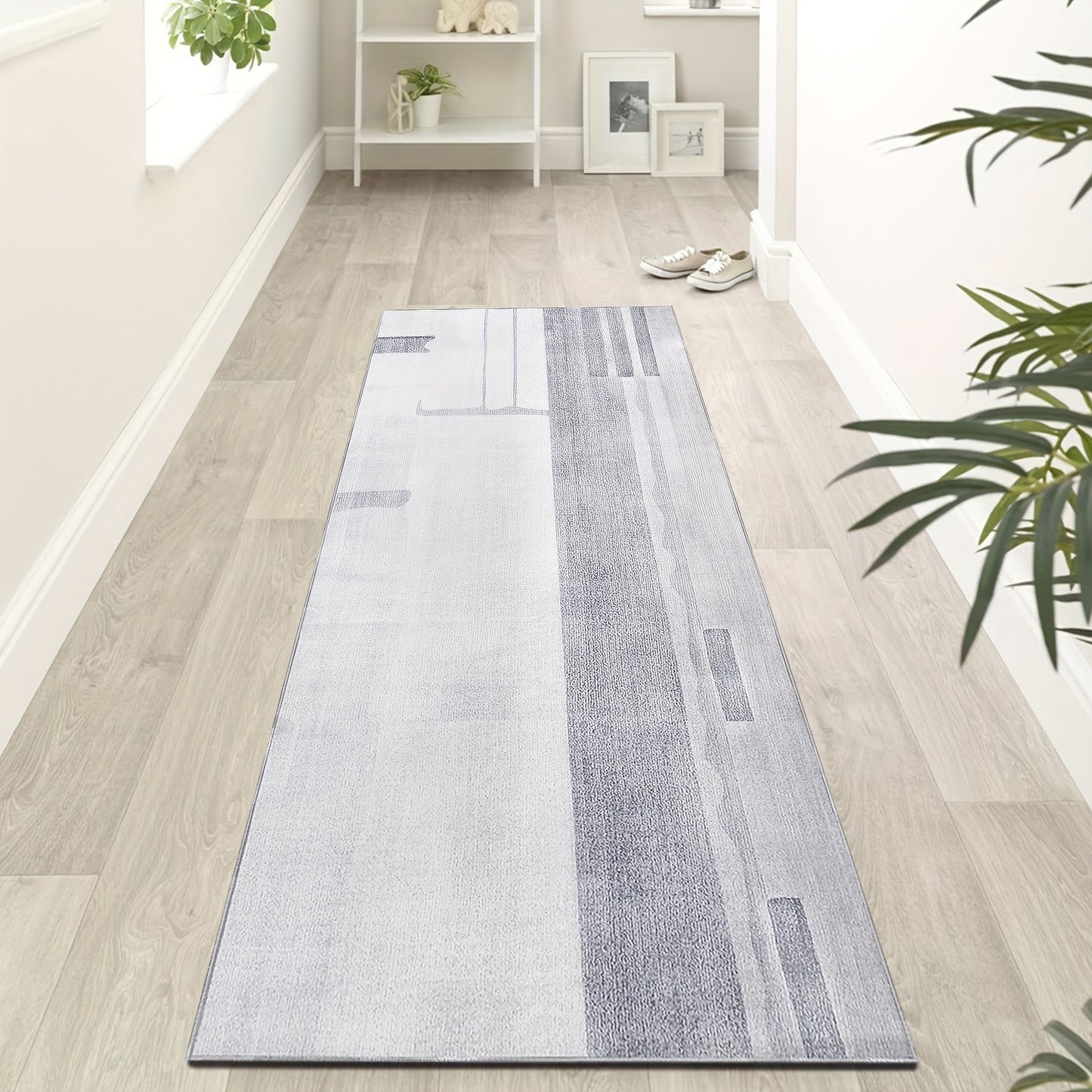 Stylish grey hallway runner rug with a modern abstract design, perfect for enhancing entryways