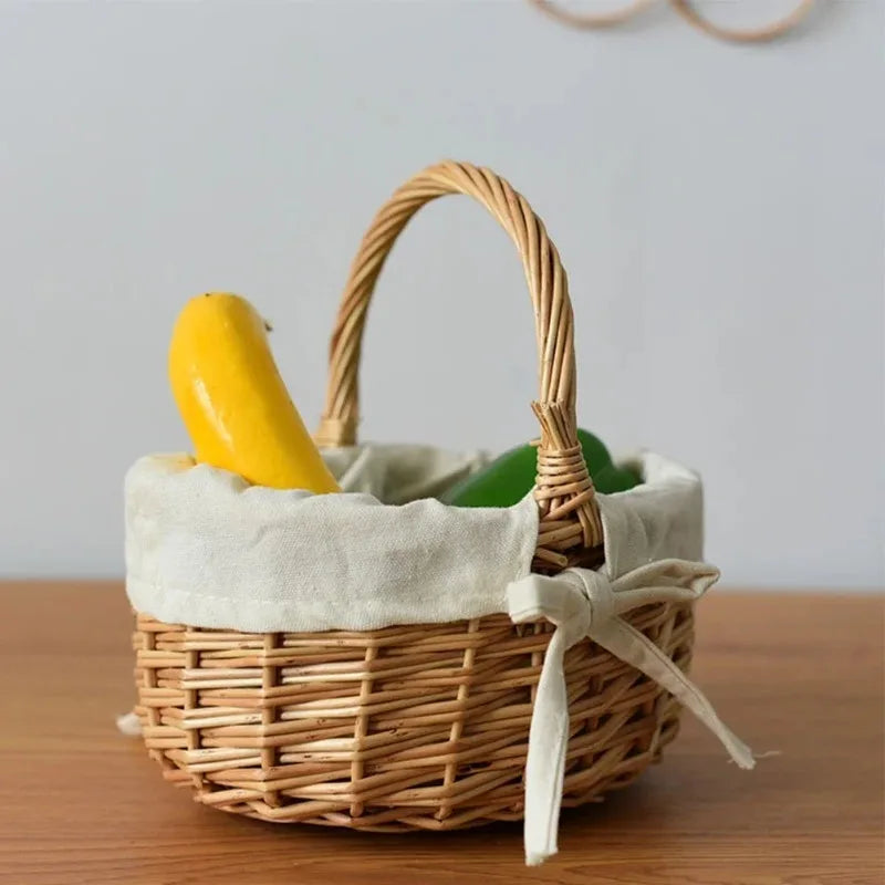 Nutshell handcrafted wicker basket with fabric lining holding yellow and green vegetables on wooden surface