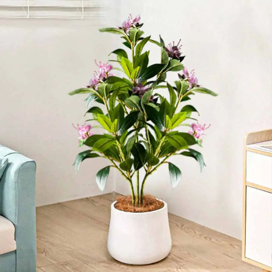 Nutshell realistic artificial magnolia tree for living room in white planter on hardwood floor