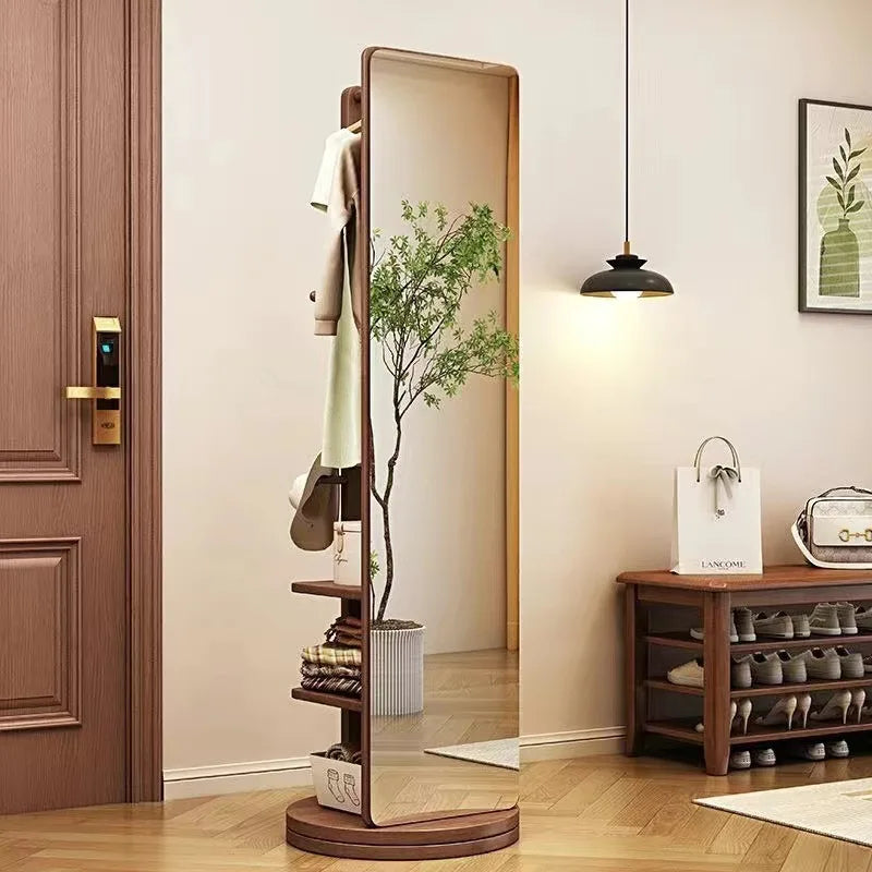 Nutshell Rotating Full Length Mirror in walnut finish with built in shelves hooks and shoe storage