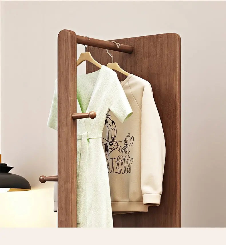 Nutshell Rotating Full Length Mirror in walnut wood with built in clothes rod and peg hooks