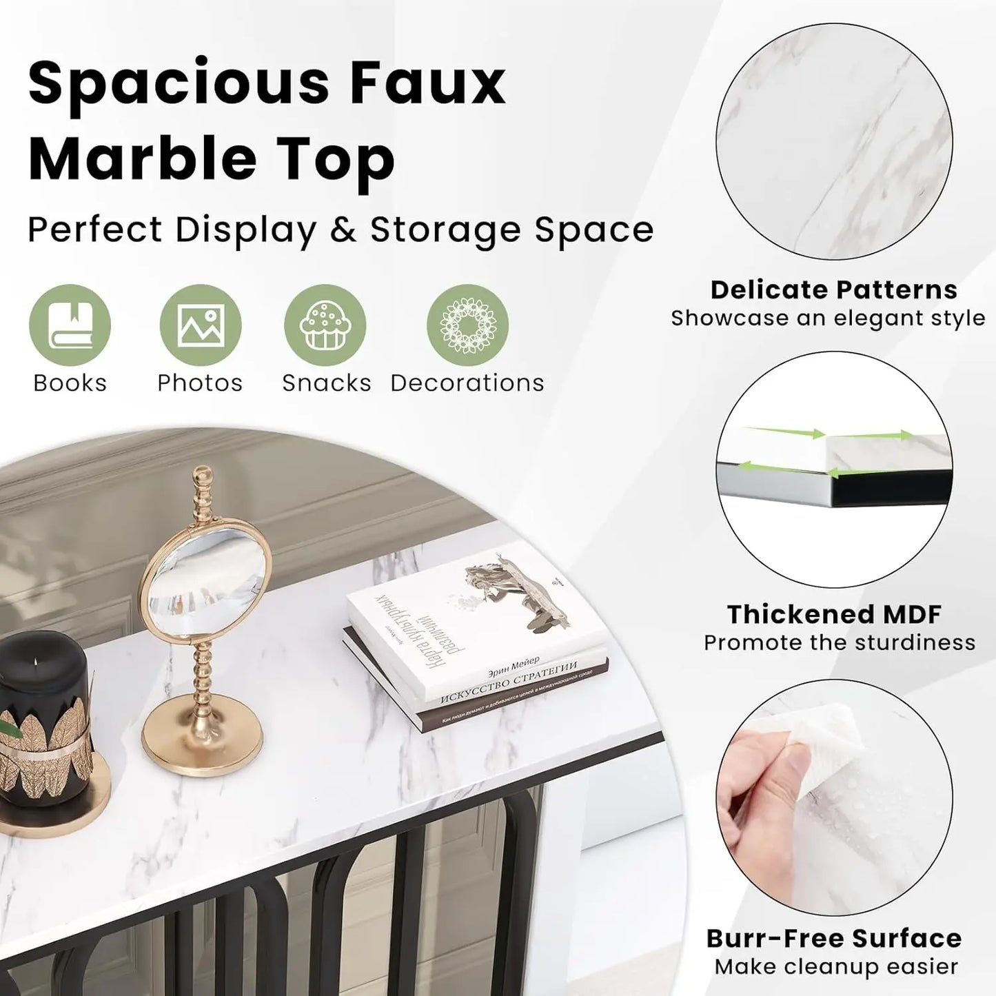Nutshell faux marble console table with white veined top and black metal base, styled with mirror, book, and candle