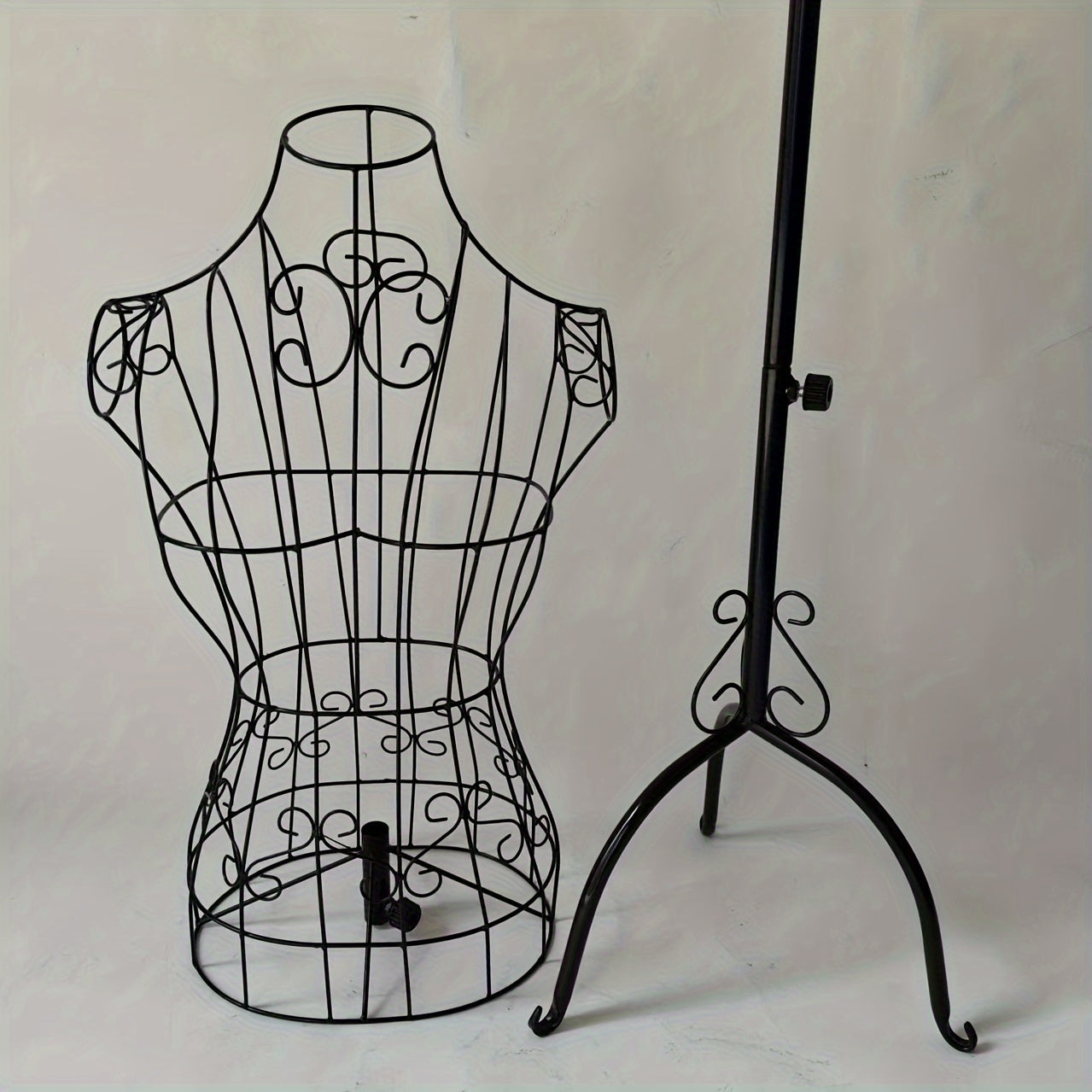 Iron Female Mannequin in black wire design, ideal for displaying clothing and accessories