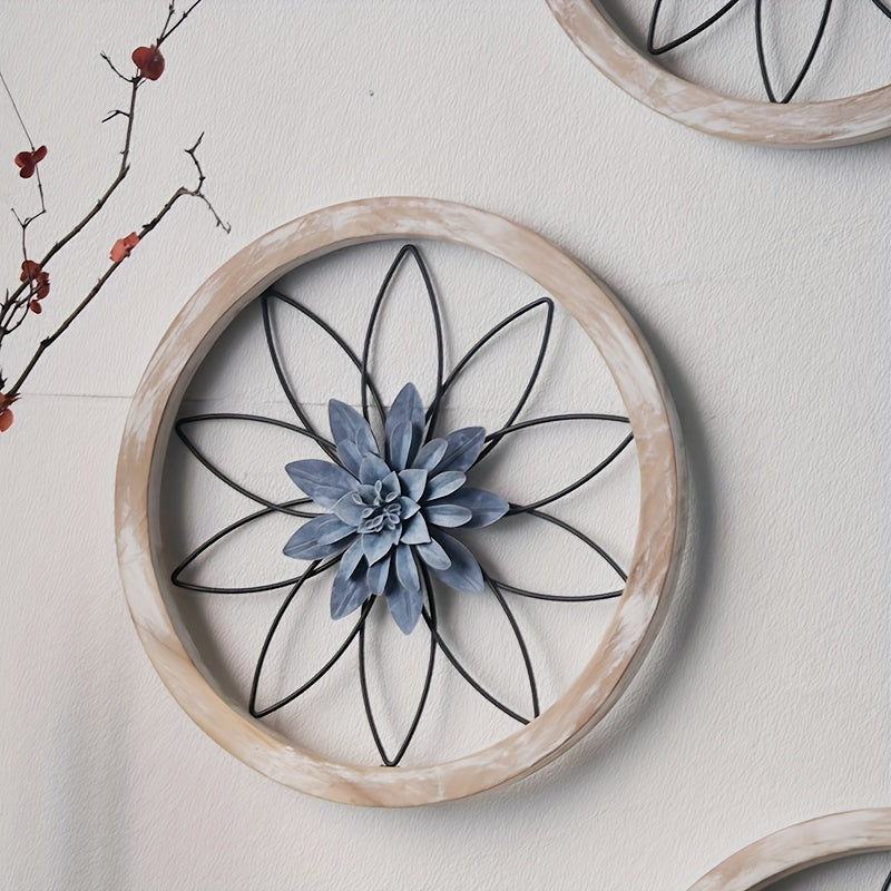 Iron flower wall decor set featuring a blue flower design in a round wooden frame