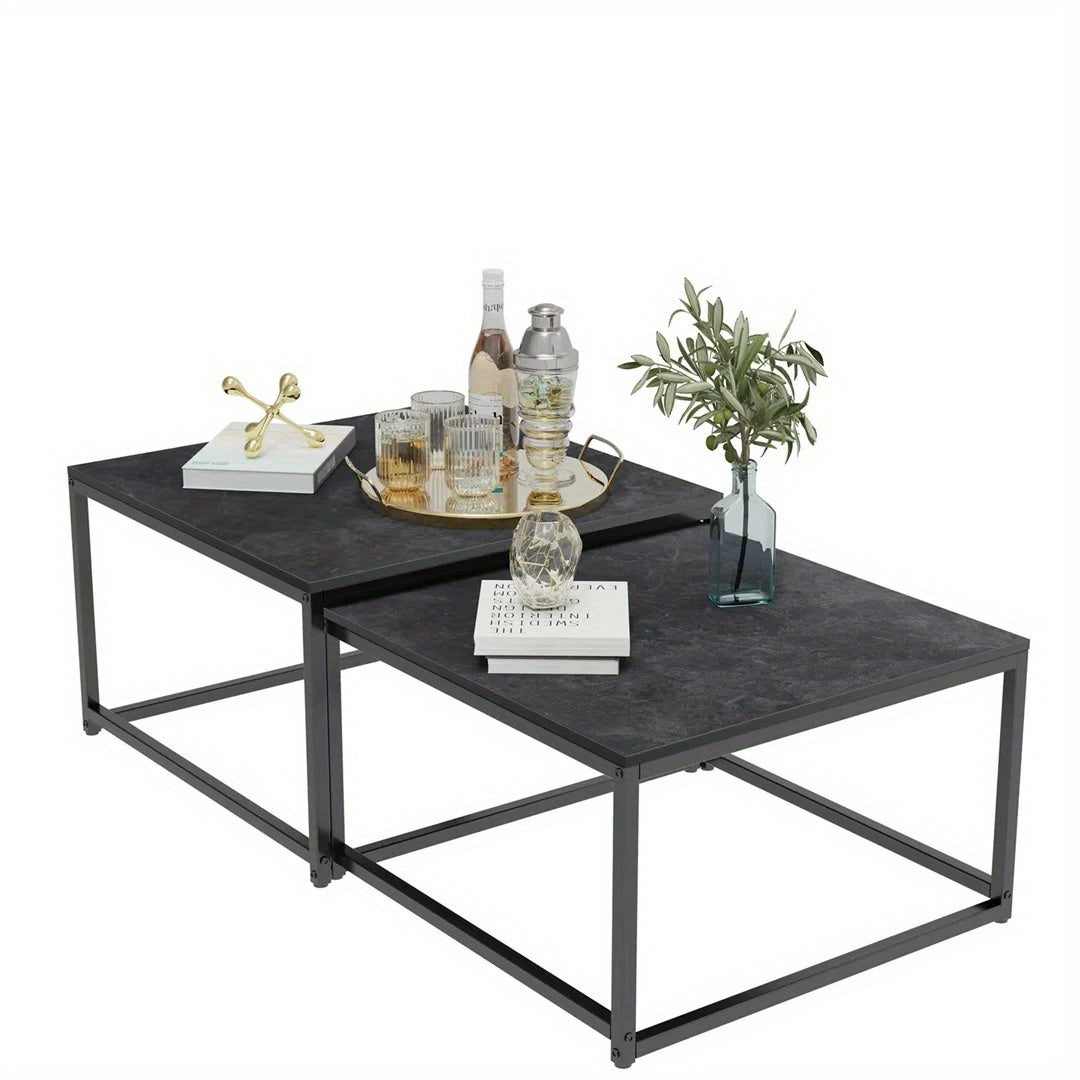Nutshell Rectangle Nesting Coffee Table Set with black metal frames and dark tabletops styled with decor