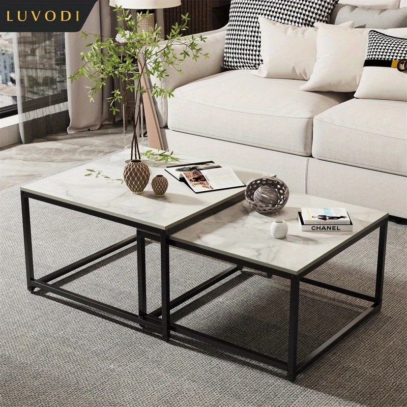 Rectangle Nesting Coffee Table Set with black metal frames and white marble tops in modern living room