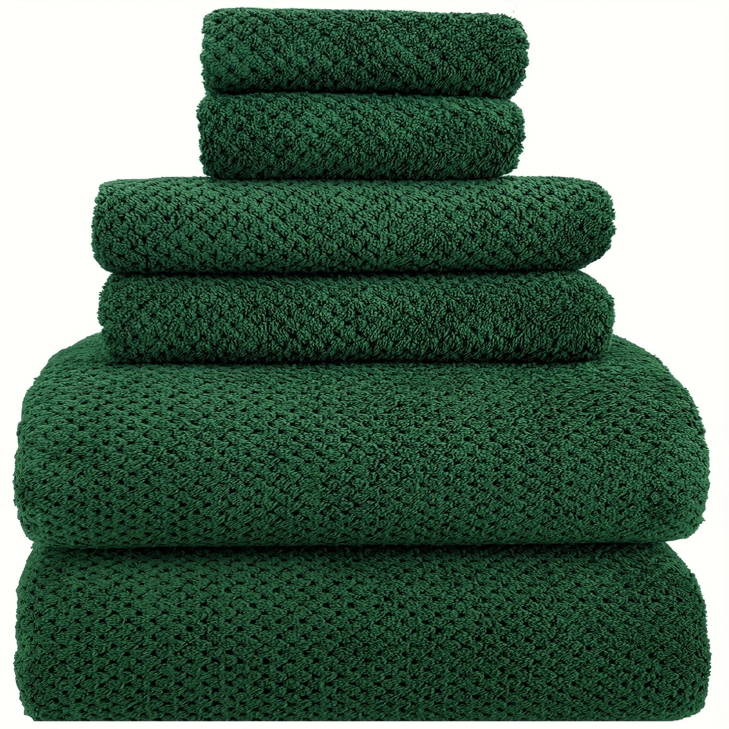 Nutshell luxury bath towel set in deep green, featuring multiple sizes for a complete bathroom experience