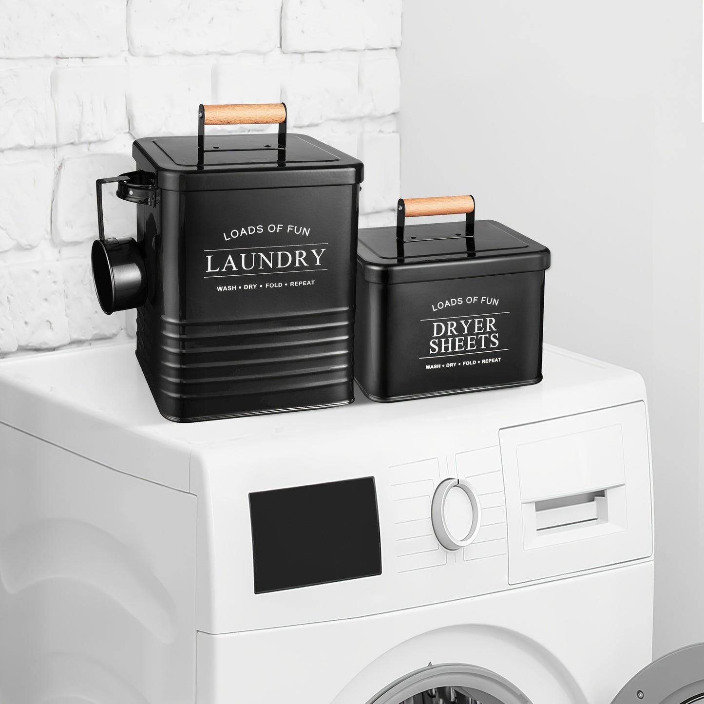 Nutshell modern farmhouse laundry storage bins in black on top of a washing machine