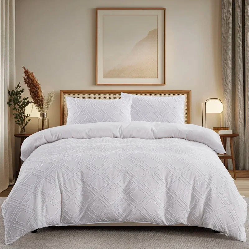 Nutshell modern geometric duvet cover in white on bed with matching pillow shams in cozy bedroom