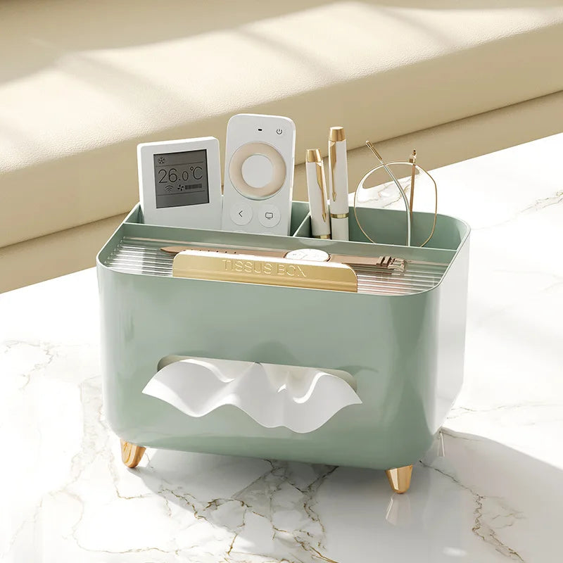 Nutshell multifunctional desk organizer with tissue box in green holding remote controls, pens, and glasses