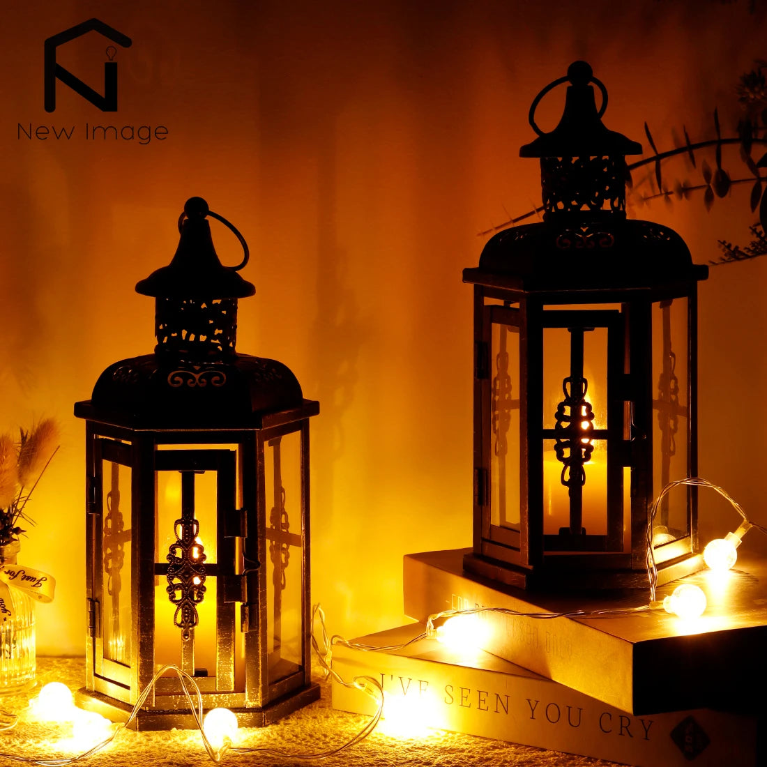 Nutshell vintage candle holder lanterns with intricate metal design glowing warmly in dim lighting