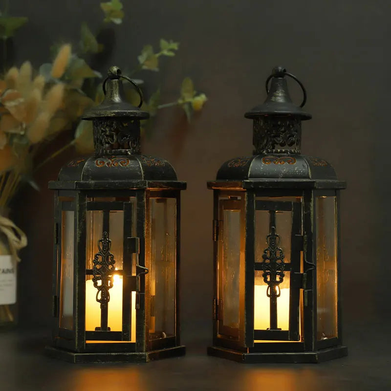 Nutshell vintage candle holder lanterns with intricate metalwork and warm candlelight inside