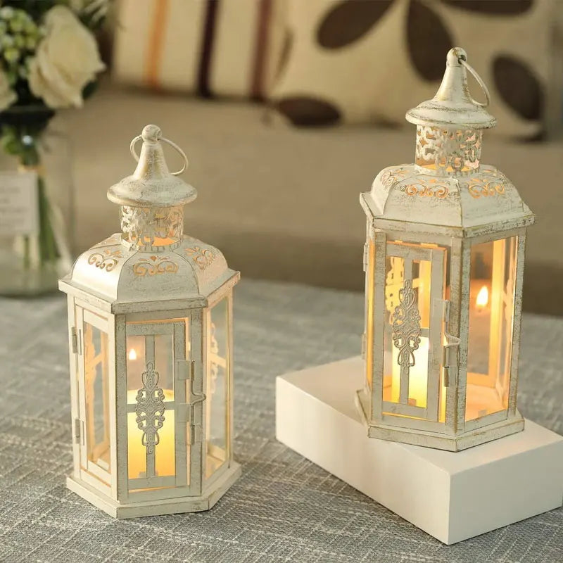 Nutshell vintage candle holder lanterns with intricate metal designs and warm glowing candles