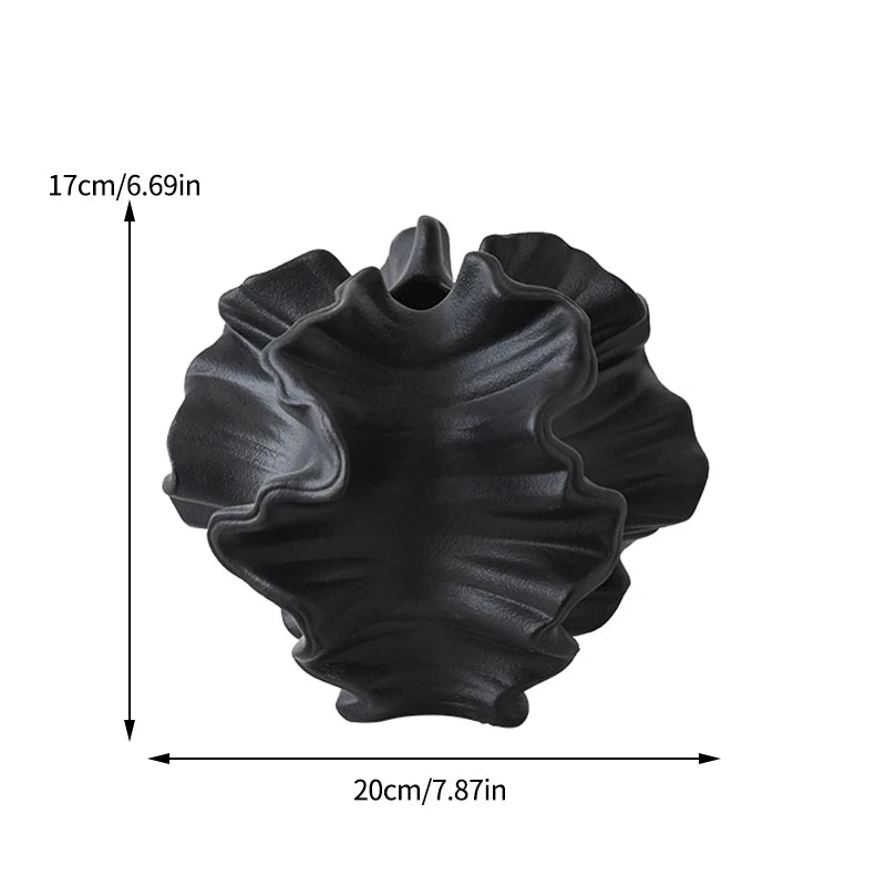 Nutshell black Nordic art coral vase with wavy design measuring 20cm by 17cm