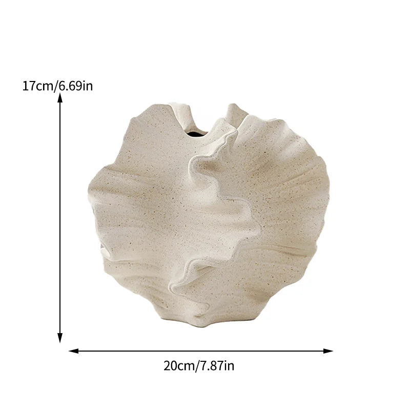 Nutshell Nordic art coral vase in beige with textured organic shape measuring 20cm by 17cm