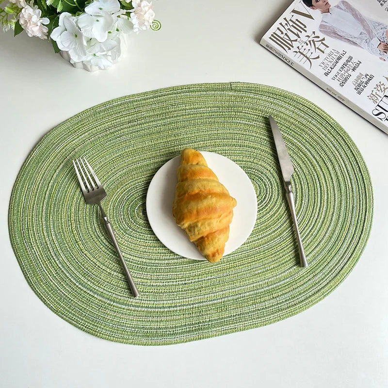 Green Oval Braided Placemats perfect for enhancing dining table decor with stylish protection