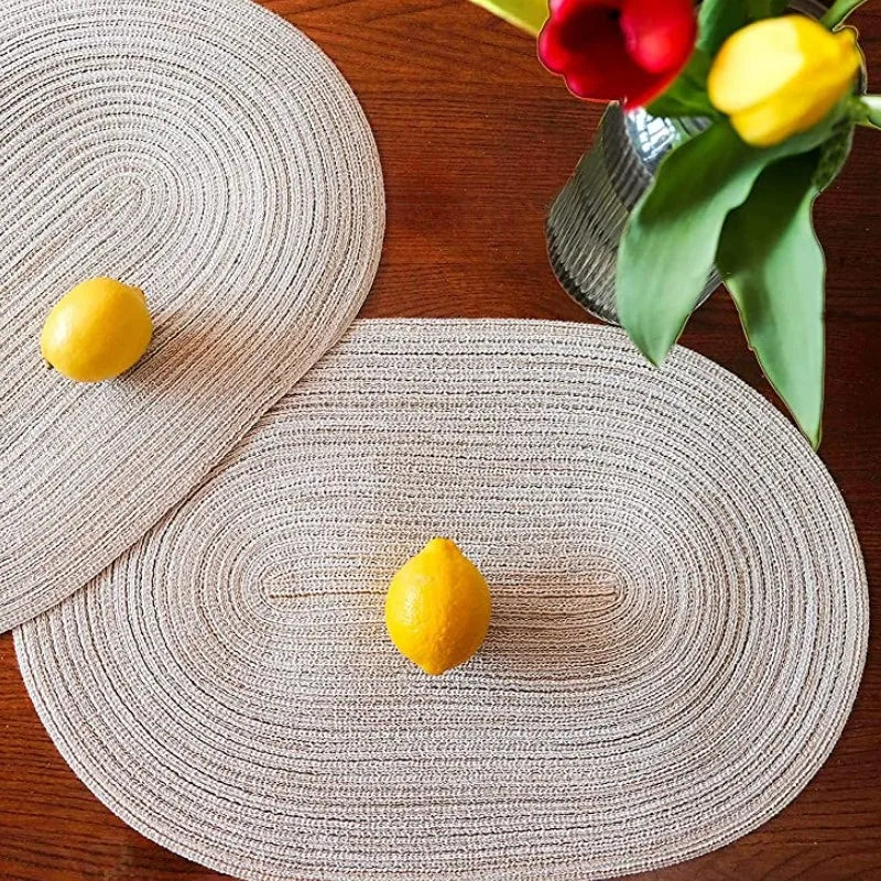 Oval Braided Placemats in Natural Fiber with Fresh Lemon Decor on Wooden Table
