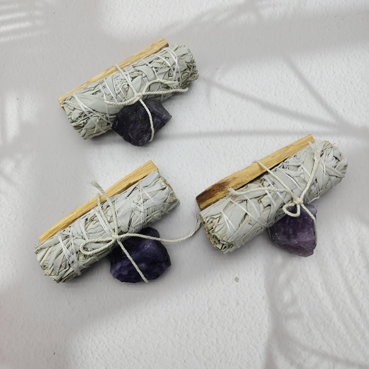 Palo Santo White Sage Crystal set featuring bundles of sage with crystals for cleansing and healing