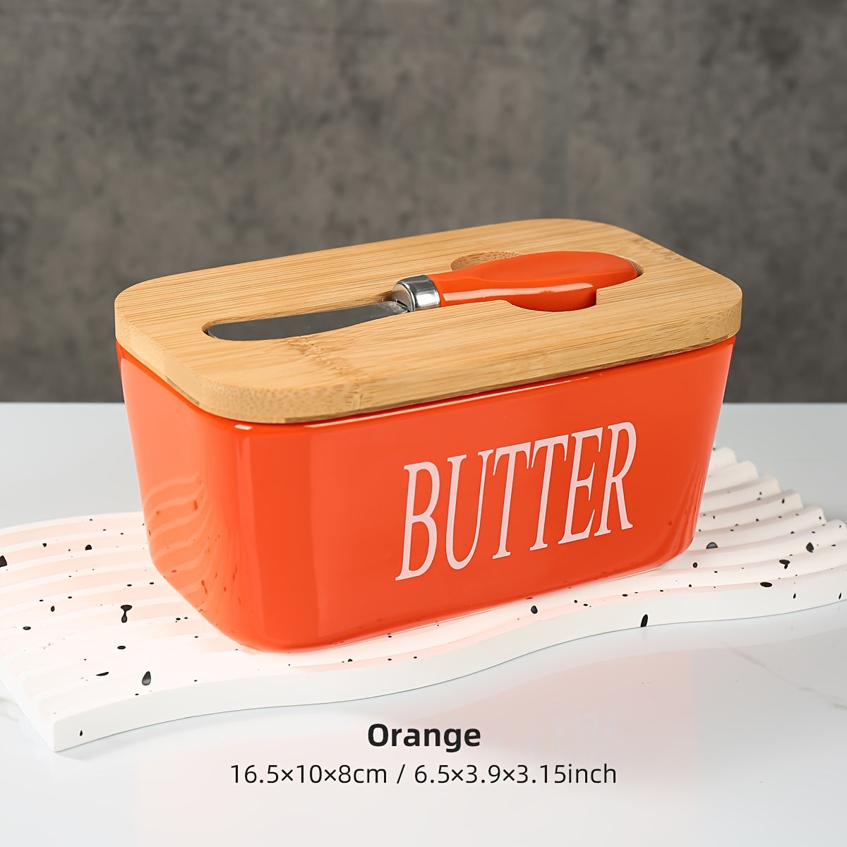 Nutshell porcelain butter box with bamboo lid in orange with butter label and butter knife