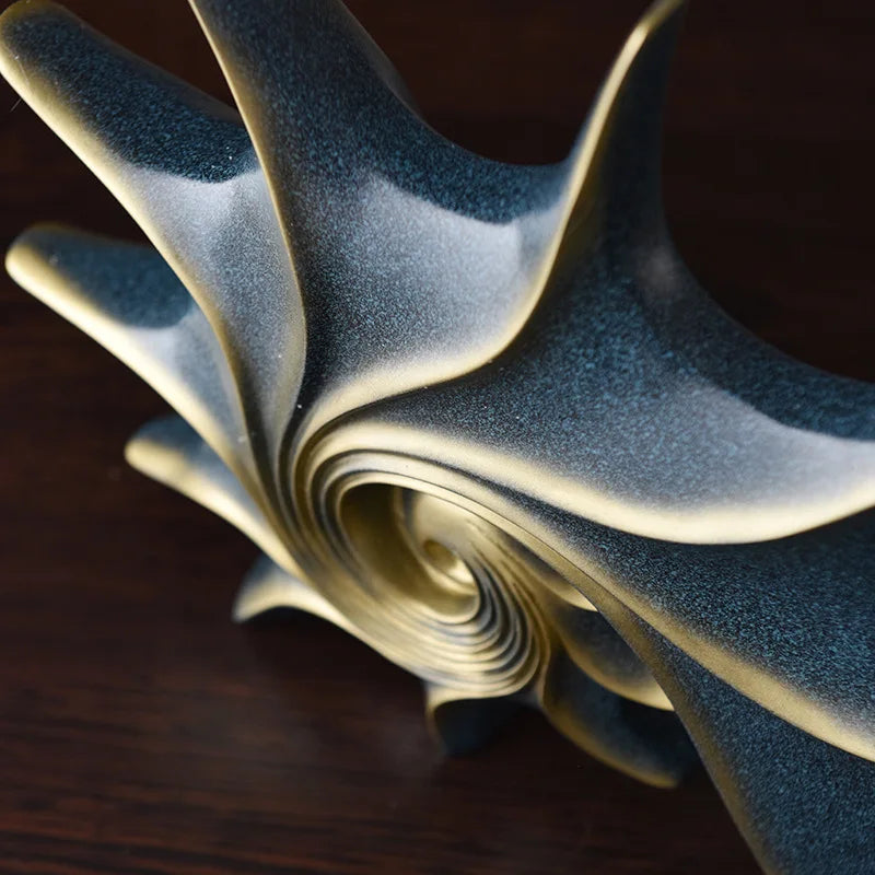 Nutshell resin conch Nordic statue decor in gray and beige tones with spiral design ornament