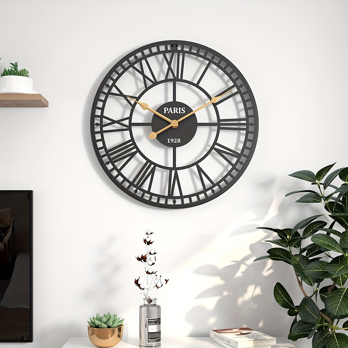 Elegant Roman numeral wall clock with a Paris design and gold accents on a black background