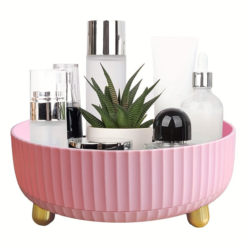 Nutshell Rotating Makeup and Perfume Organizer in Pink with Multiple Cosmetic Bottles and Plants