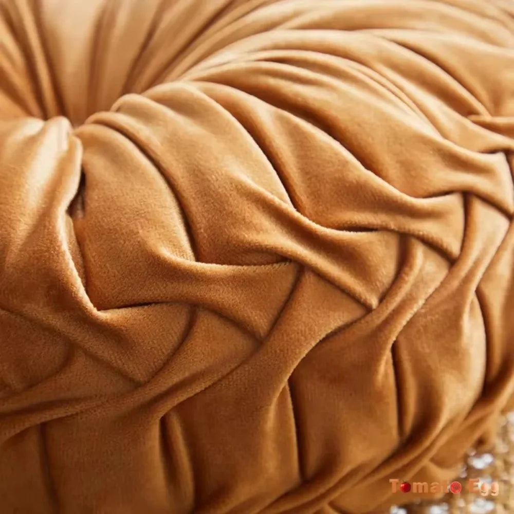 Nutshell round pumpkin pillow in soft textured fabric with rich autumnal orange color
