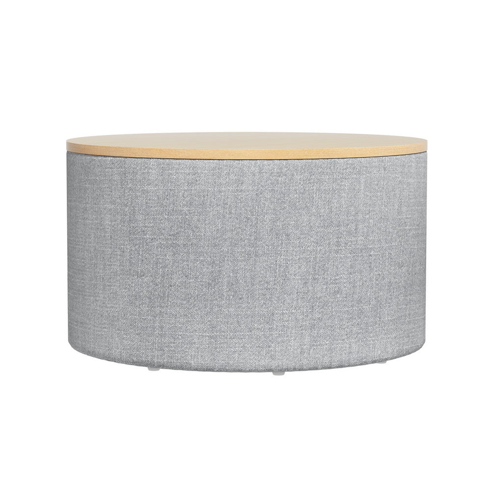 Nutshell round storage ottoman with gray fabric body and wooden top for living room