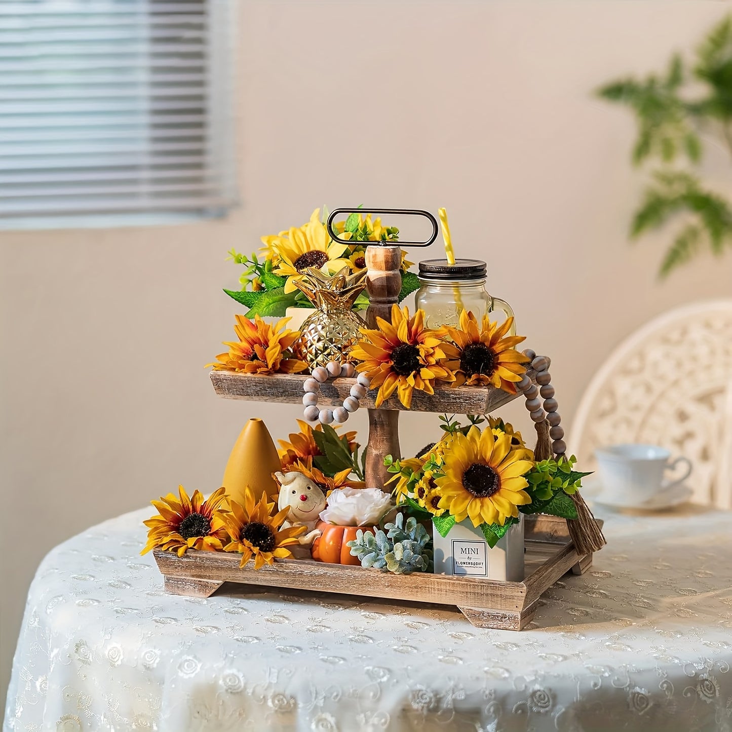 Nutshell rustic farmhouse tiered tray adorned with sunflowers and decorative accents for elegant home decor