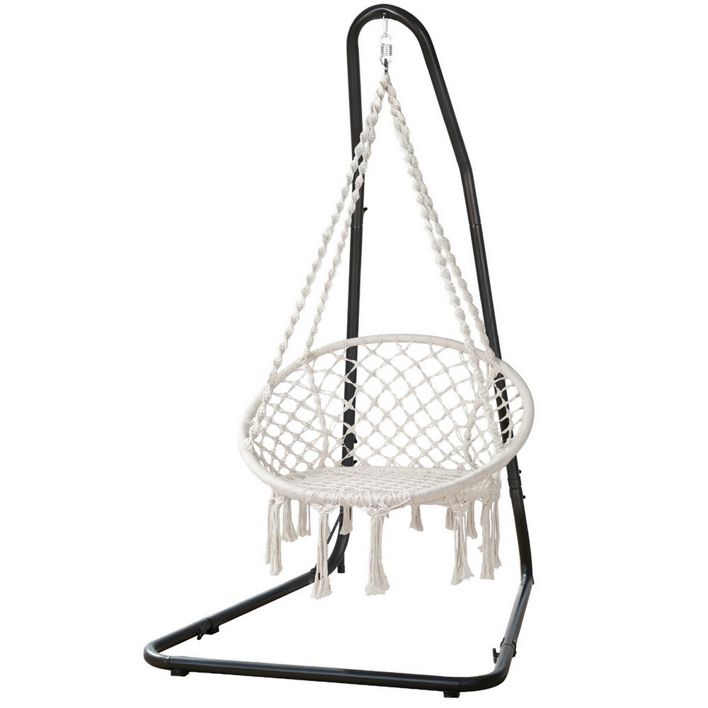Nutshell white macrame hammock chair with stand on black metal frame fringe and braided ropes