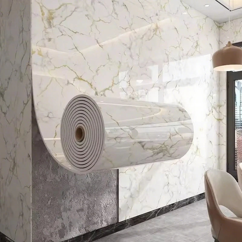 Nutshell wall paper roll showing glossy white marble pattern with gold veins applied as imitation ceramic tile wall covering