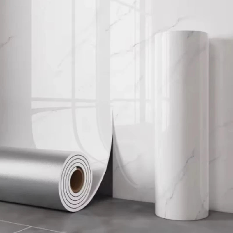 Nutshell wall paper rolls with white marble gloss pattern on floor showing imitation ceramic tile look