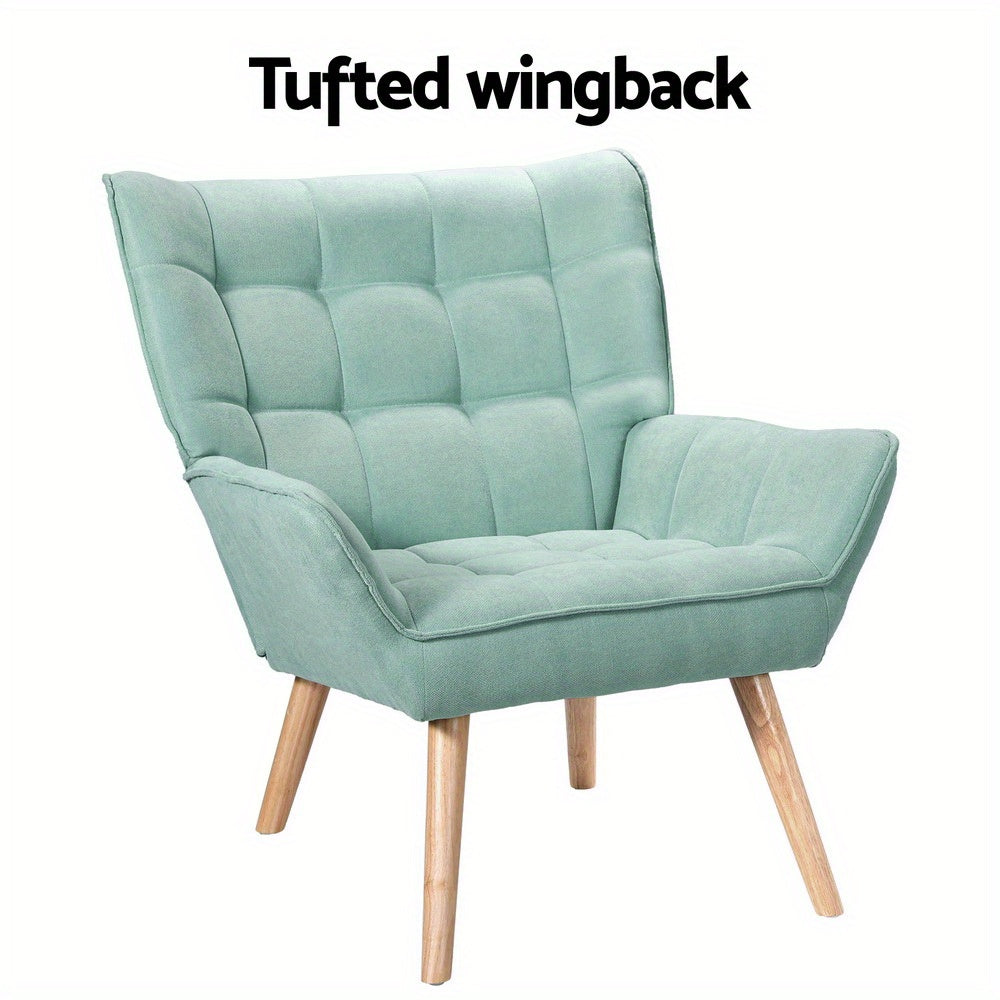 Nutshell Tufted Wingback Armchair in light green fabric with wooden legs