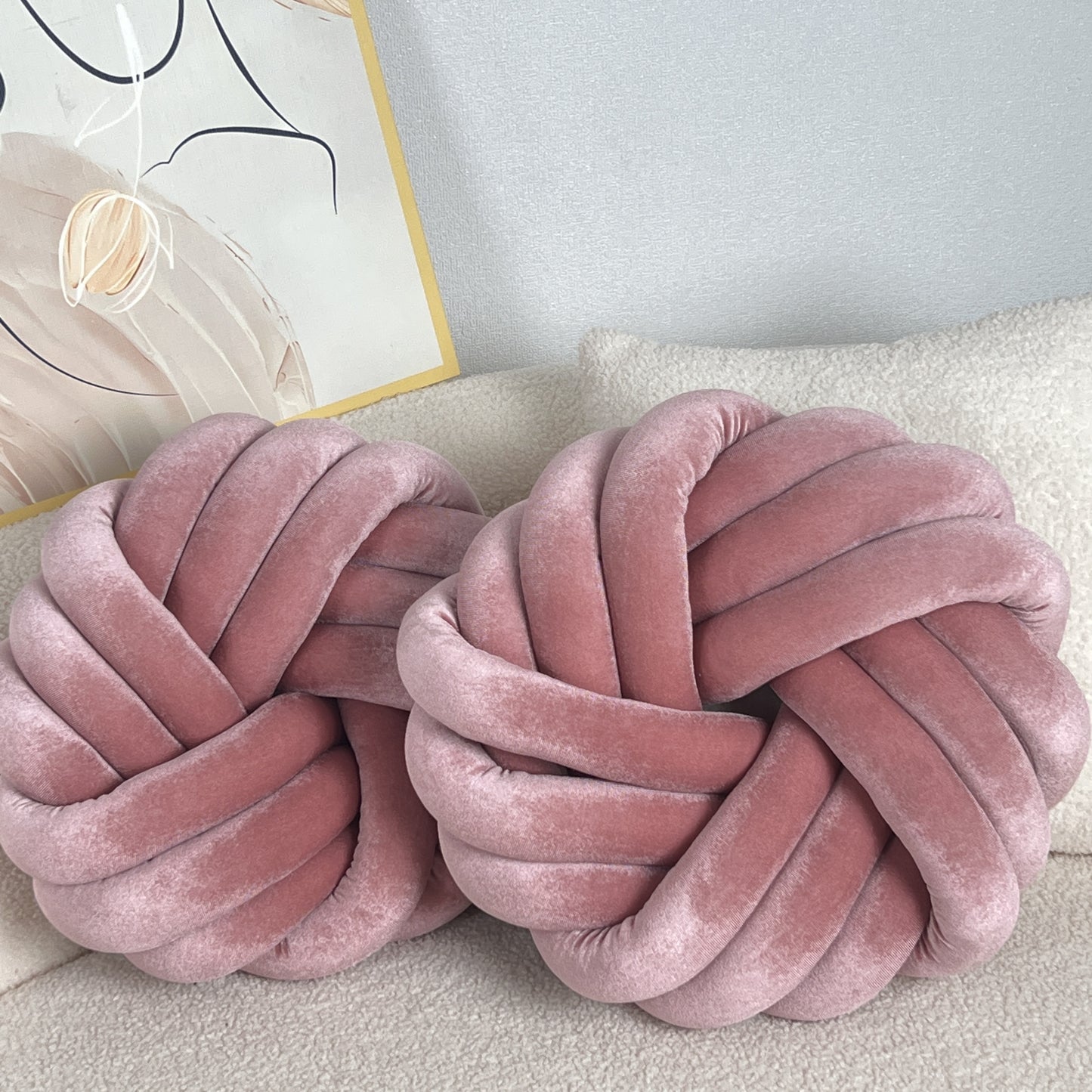 Two Piece Set Round Velvet Knot Cushion in soft pink, perfect for home decor and comfort